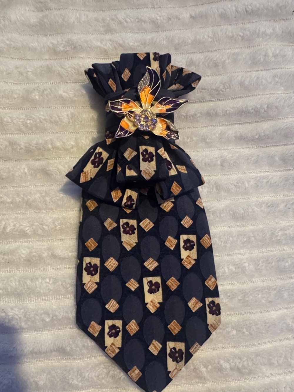 Navy Geometric Floral Necktie with Gold Flower Brooch